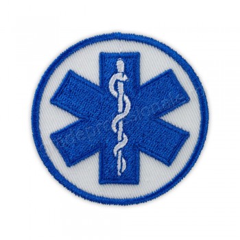 Emblema coifura ambulanta